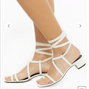 Strappy open toe heel